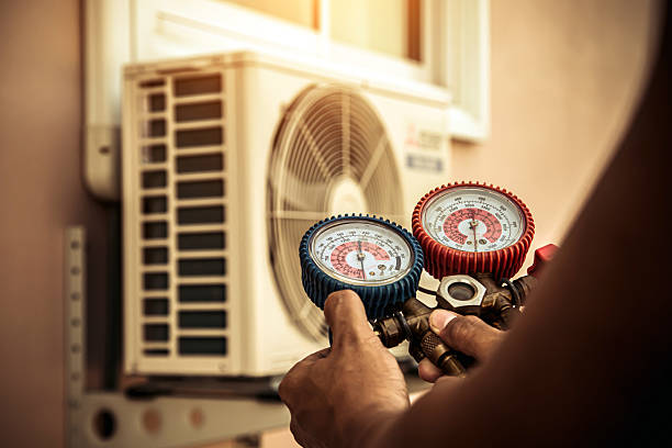 Professional Hvac technician working in Arlington, IN